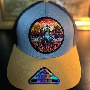 Cowboy in the sunset Trucker Hat